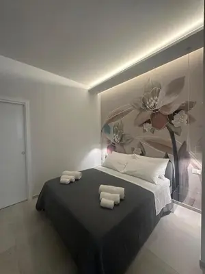 Letto o letti in una camera di casa majorana