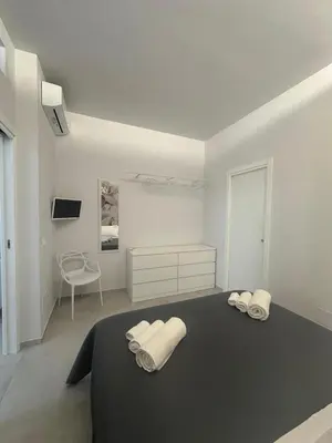 Letto o letti in una camera di casa majorana