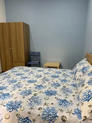Letto o letti in una camera di Angú - Casa Vacanze