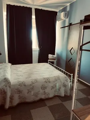 Letto o letti in una camera di Harmony Station
