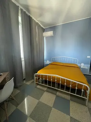 Letto o letti in una camera di Harmony Station