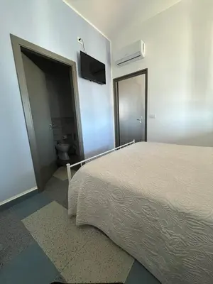 Letto o letti in una camera di Harmony Station