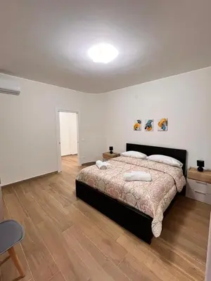 Letto o letti in una camera di Levante
