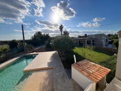 Piscina di HELOROS HOLIDAY VILLAS - Villa Garden Chic o nelle vicinanze