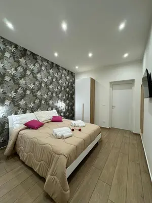 Letto o letti in una camera di Il Tulipano house