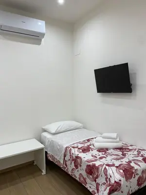 Letto o letti in una camera di Il Tulipano house