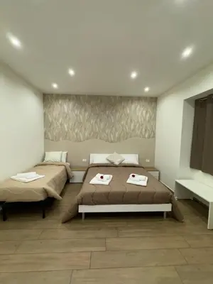 Letto o letti in una camera di Il Tulipano house