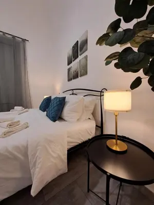 Letto o letti in una camera di Memo Home