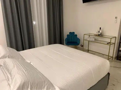 Letto o letti in una camera di Bellini Luxury Suite Superior