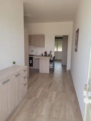 Cucina o angolo cottura di HOUSE AIRPORT Catania 2