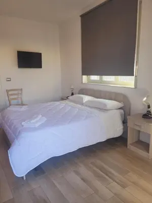 Letto o letti in una camera di HOUSE AIRPORT Catania 3
