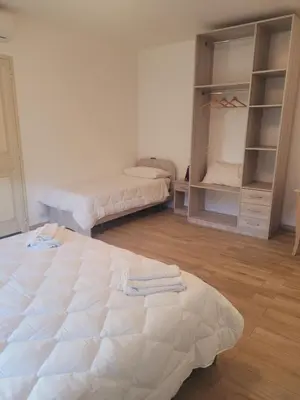 Letto o letti in una camera di HOUSE AIRPORT Catania 3