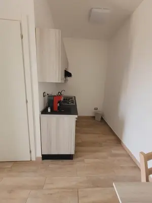 Cucina o angolo cottura di HOUSE AIRPORT Catania 4