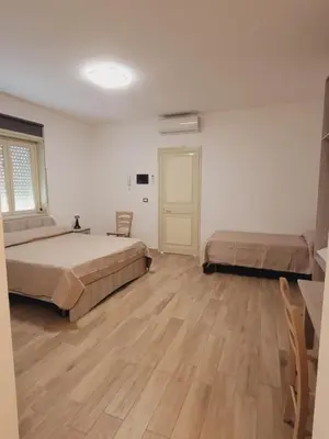 Letto o letti in una camera di HOUSE AIRPORT Catania 4