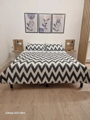 Letto o letti in una camera di BlueSkyHouse Centro Catania