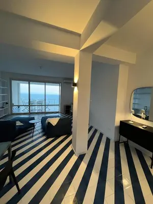 Letto o letti in una camera di Oltremare