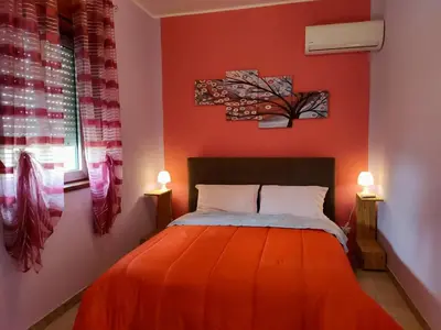 Letto o letti in una camera di Villa Guido