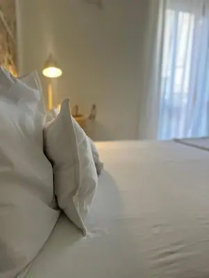 Letto o letti in una camera di F Home
