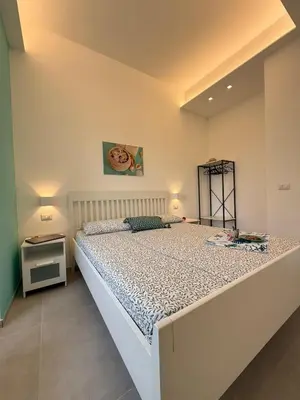 Letto o letti in una camera di Villa Acquamarina