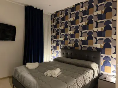 Letto o letti in una camera di Sweet Home Holiday House