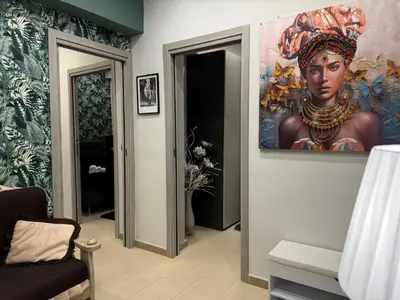 Area soggiorno di Sweet Home Holiday House