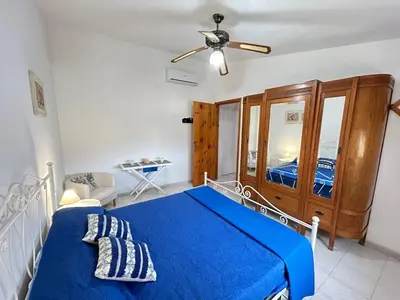 Letto o letti in una camera di Villa Malsine