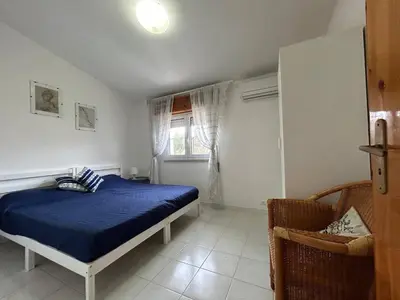 Letto o letti in una camera di Villa Malsine