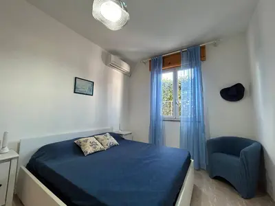 Letto o letti in una camera di Villa Malsine