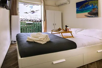 Letto o letti in una camera di Home La Marina