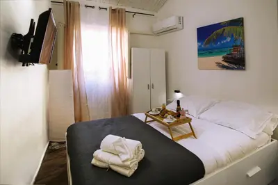 Letto o letti in una camera di Home La Marina