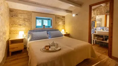 Letto o letti in una camera di Casale Palombieri by DomuSicily
