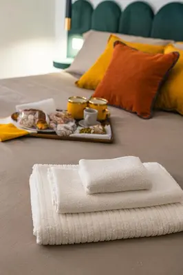 Letto o letti in una camera di Mirò Suite Catania - Elegant Apartment Centro Storico