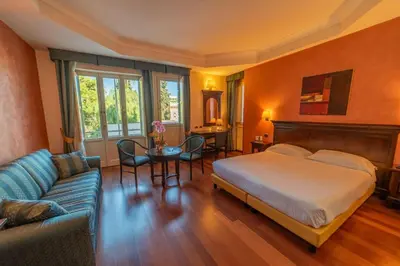 Letto o letti in una camera di Hotel Teocrito