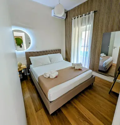 Letto o letti in una camera di Lues Rooms