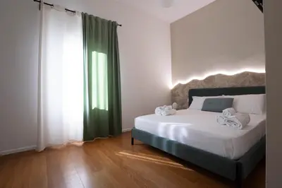 Letto o letti in una camera di Lues Rooms