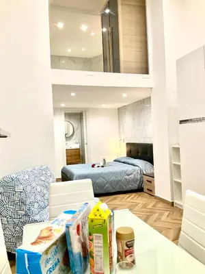 Letto o letti in una camera di Gold suite19