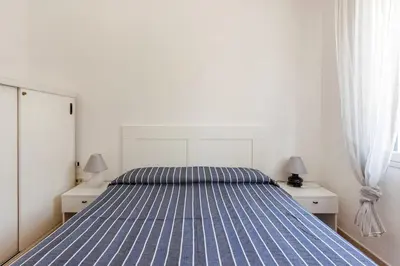 Letto o letti in una camera di Villa La Pineta