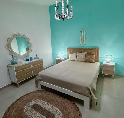 Letto o letti in una camera di Villa Mare Shabby Chic