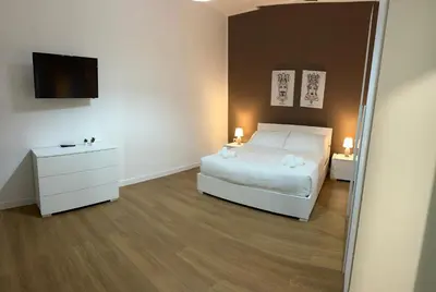 Letto o letti in una camera di Sicilia nel Cuore Apartment
