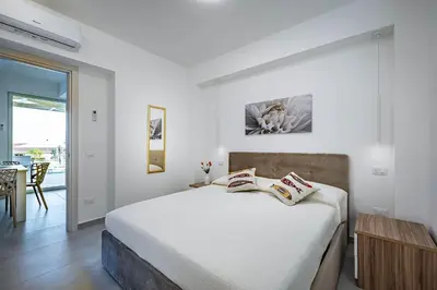 Letto o letti in una camera di Shalamu Luxury Apartments