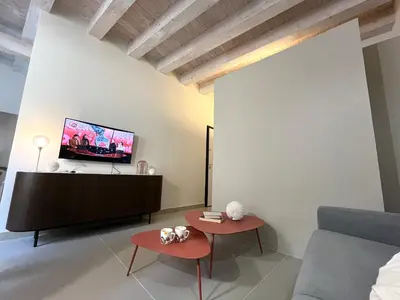 TV o dispositivi per l'intrattenimento presso Insula - Apartments & Comfort in Ortigia