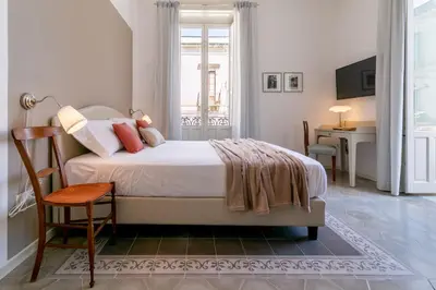 Letto o letti in una camera di Autentica Ortigia Apartments