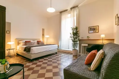 Letto o letti in una camera di Autentica Ortigia Apartments