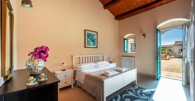 Letto o letti in una camera di Agriturismo Borgo degli ulivi