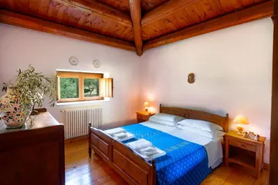 Letto o letti in una camera di Agriturismo Borgo degli ulivi