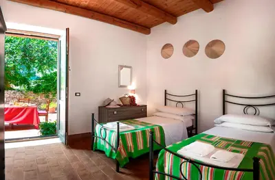 Letto o letti in una camera di Agriturismo Borgo degli ulivi