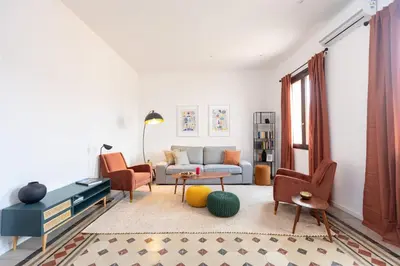 Area soggiorno di Casa Charlotte by Ortigia Apartments
