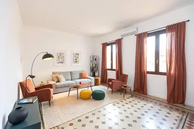 Area soggiorno di Casa Charlotte by Ortigia Apartments