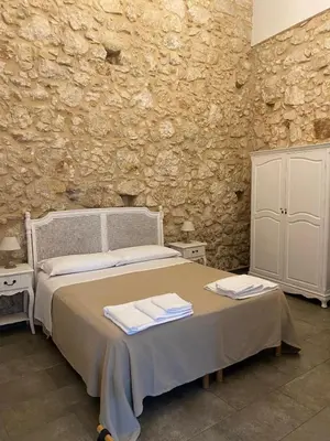 Letto o letti in una camera di Corte Sicula