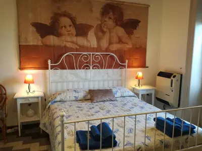 Letto o letti in una camera di Aretè Guest House
